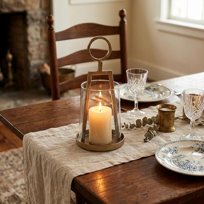 Small Farmhouse Hurricane Candle Holder (4.3" W x 9.2" H), Antique Brass Metal Lantern with Clear Glass Sleeve, Compact Tabletop Decor for Pillar Candles & Small Plants